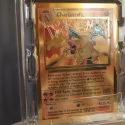 NO LONGER AVAILABLE - Not For Sale - 25th-Anniversary Gold Metal Charizard Card Celebrations untouched