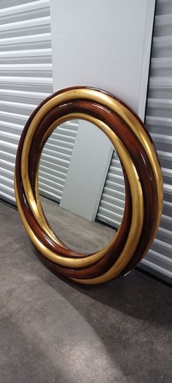 LARGE GILTWOOD MIRROR by Harrison & Gil