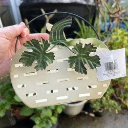 Small metal basket or bucket. This is very small.