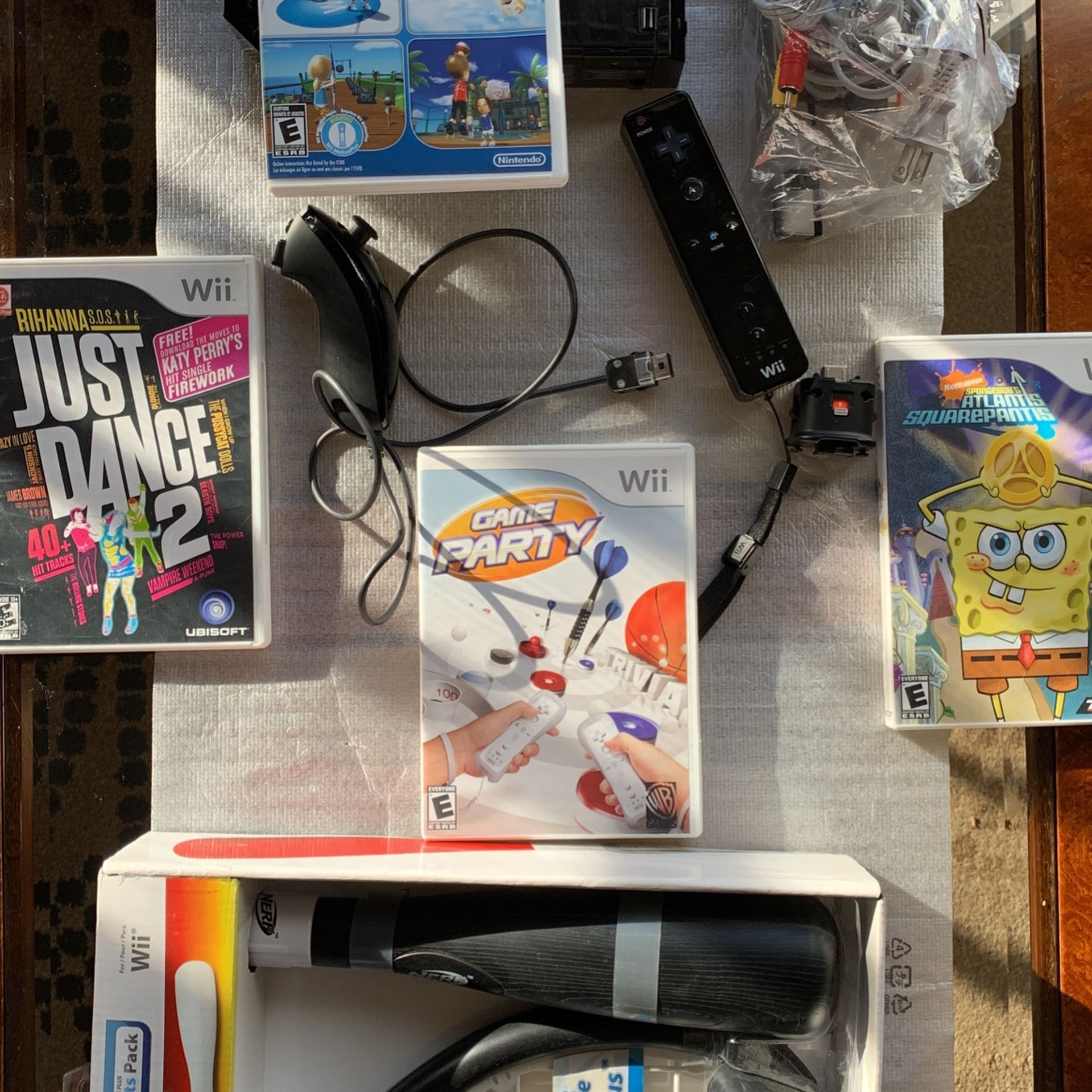Wii Black Edition With Sports Resort And Sports Pack