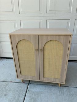 Brand new Boho Rattan Accent Cabinet with Arch Doors