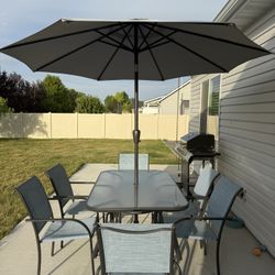 Patio Table, Chairs, and Umbrella