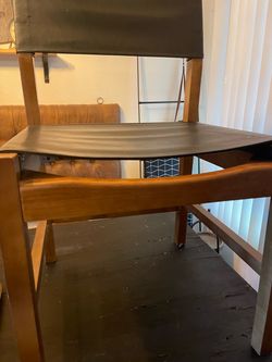 Two leather dining chairs