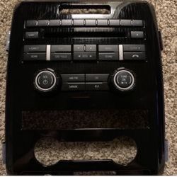 Fords F-150 09-14 am/fm cd trim plate