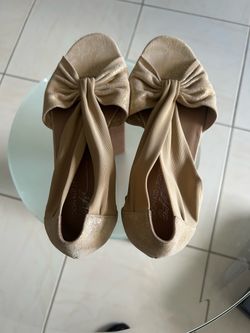 New Women’s Shoes Size 8. Design By Donald J Pliner. Beige with gold. Original Price Was $60. Very Comfortable.