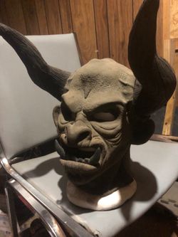 Demon  mask, zips in the back
