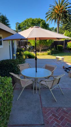 Outdoor patio dining table, chairs, umbrella