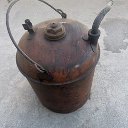 vintage Eagle metal gas can typically used for storing and transporting fuel like gasoline.  Brand: Eagle Manufacturing Material: Usually galvanized s