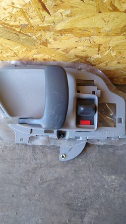 LISTED FROM DEALER STOCK IS A NEW 1995-99 GMC PICKUP FRONT LEFT INTERIOR DOOR HANDLE GRAY AND BLACK #1570841