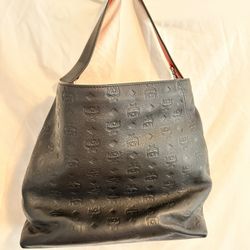 MCM Blue/Black Leather Handbag With Red Trim. Comes With Dust-bag. In Great Condition.