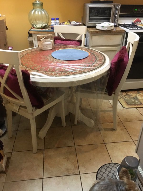 Round table and four chairs