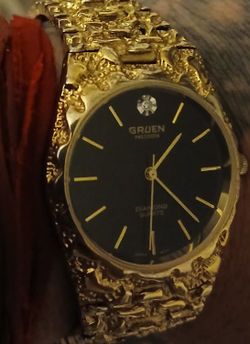 It's a cool GRUEN WATCH IN GOOD CONDITION