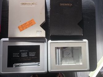 2 photo frames, both for $ 3