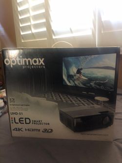 Optimax 4k projector with mounting bracket and projector screen.