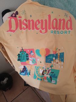 Yellow.\nDisneyland shirt xxl