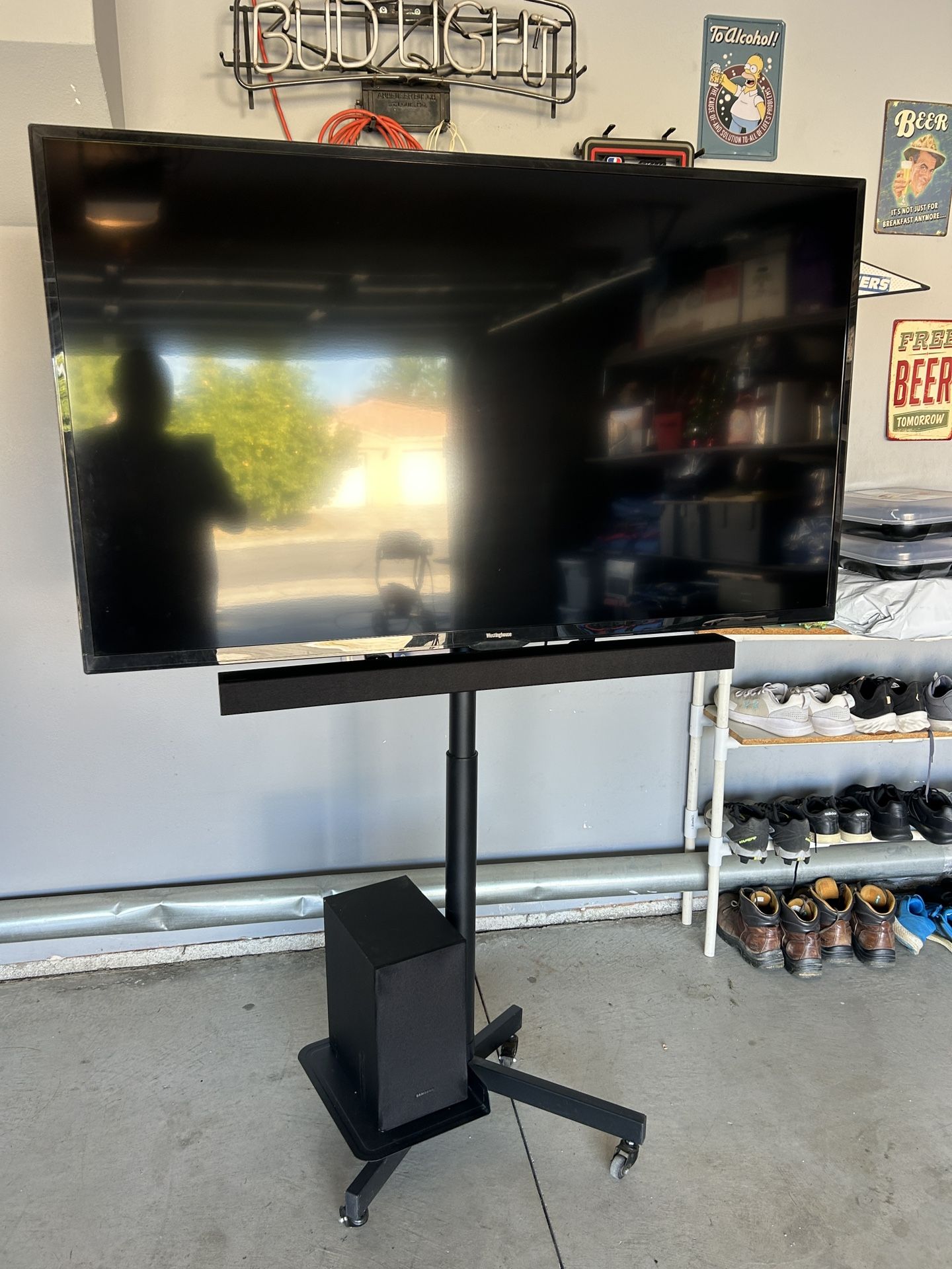 TV Stand On Wheels With 55”TV