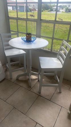High top table with two chairs