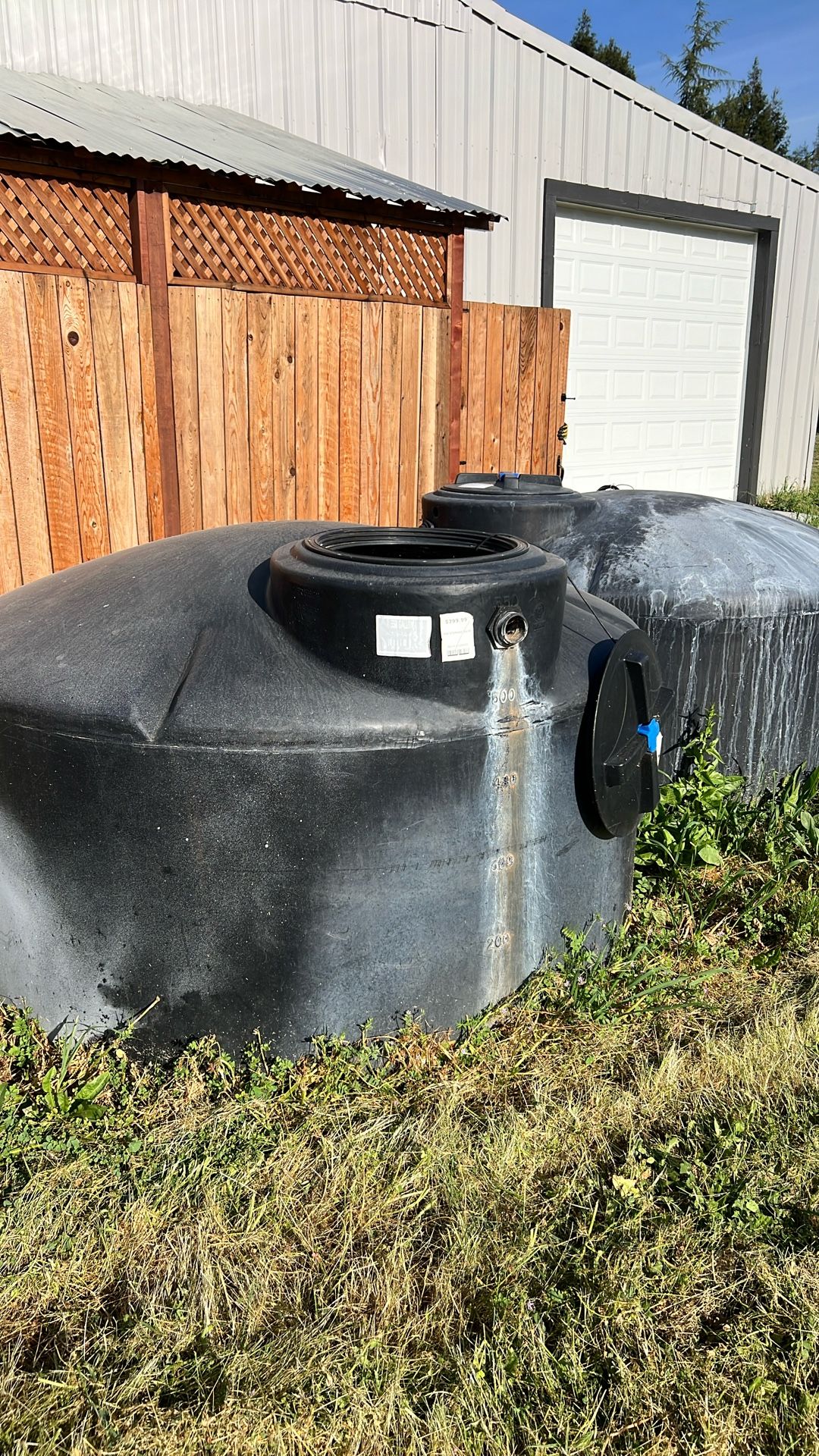 2 550 Gal Water Tanks