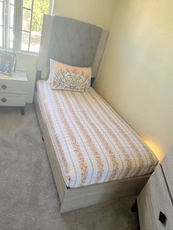2 twin beds and 2 cabinets