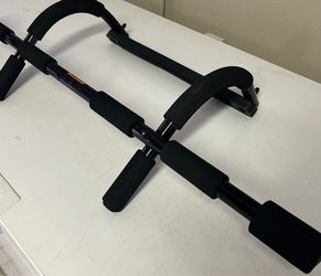 Pull up bar. Attached to door frame