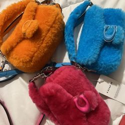 Beautiful Minny Puffing Purse 👛 🩷🧡💙