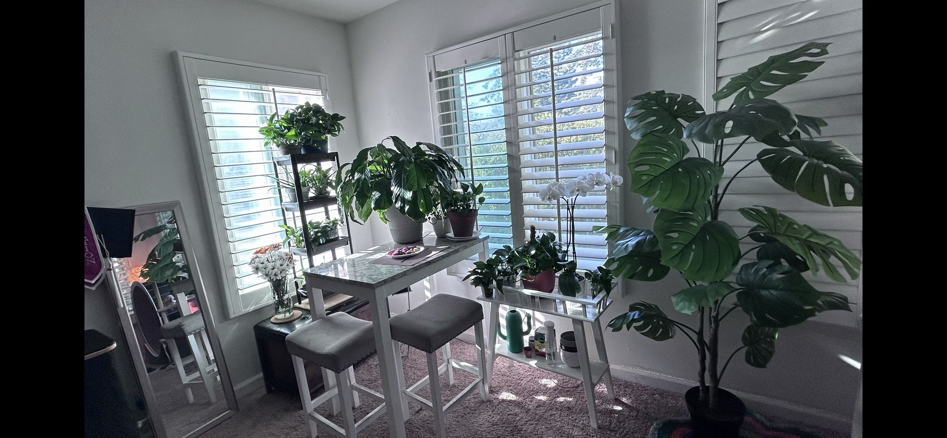 Counter height, small table, and two stools