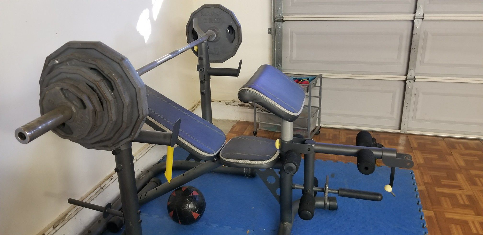 Golds gym bench and Marcy weights + total gym & sit up bench