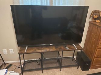 55” tcl smart roku tv with stand was in guest room