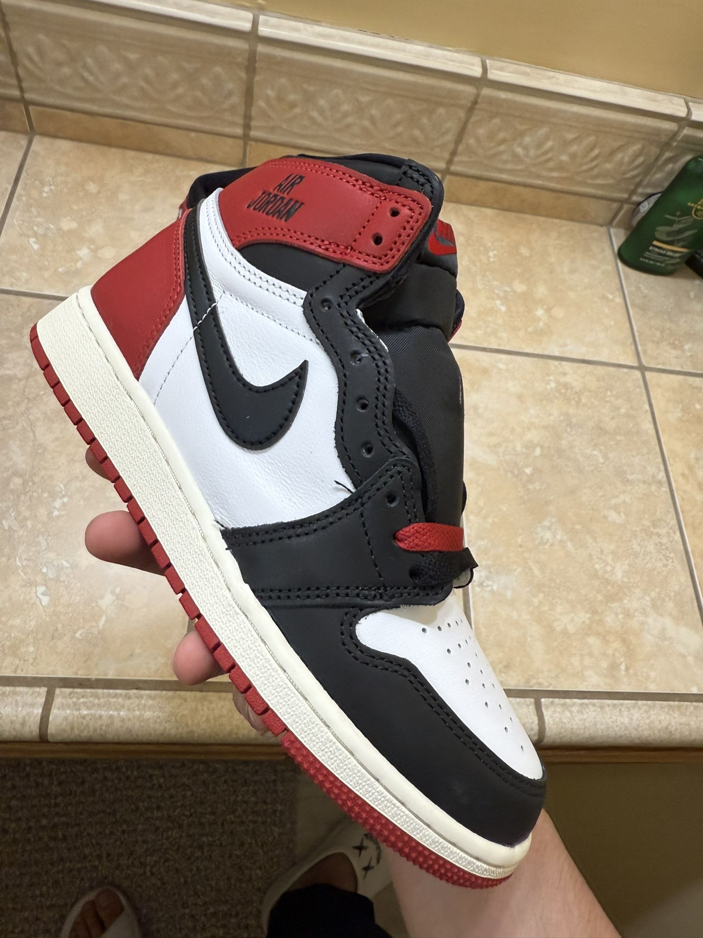 Air Jordan 1 Retro High OG black toe “reimagined”