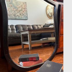 Antique  Black Shield Crest shape mirror with solid wood. 34" tall x 24.5" wide x15". Weights 20 pounds.