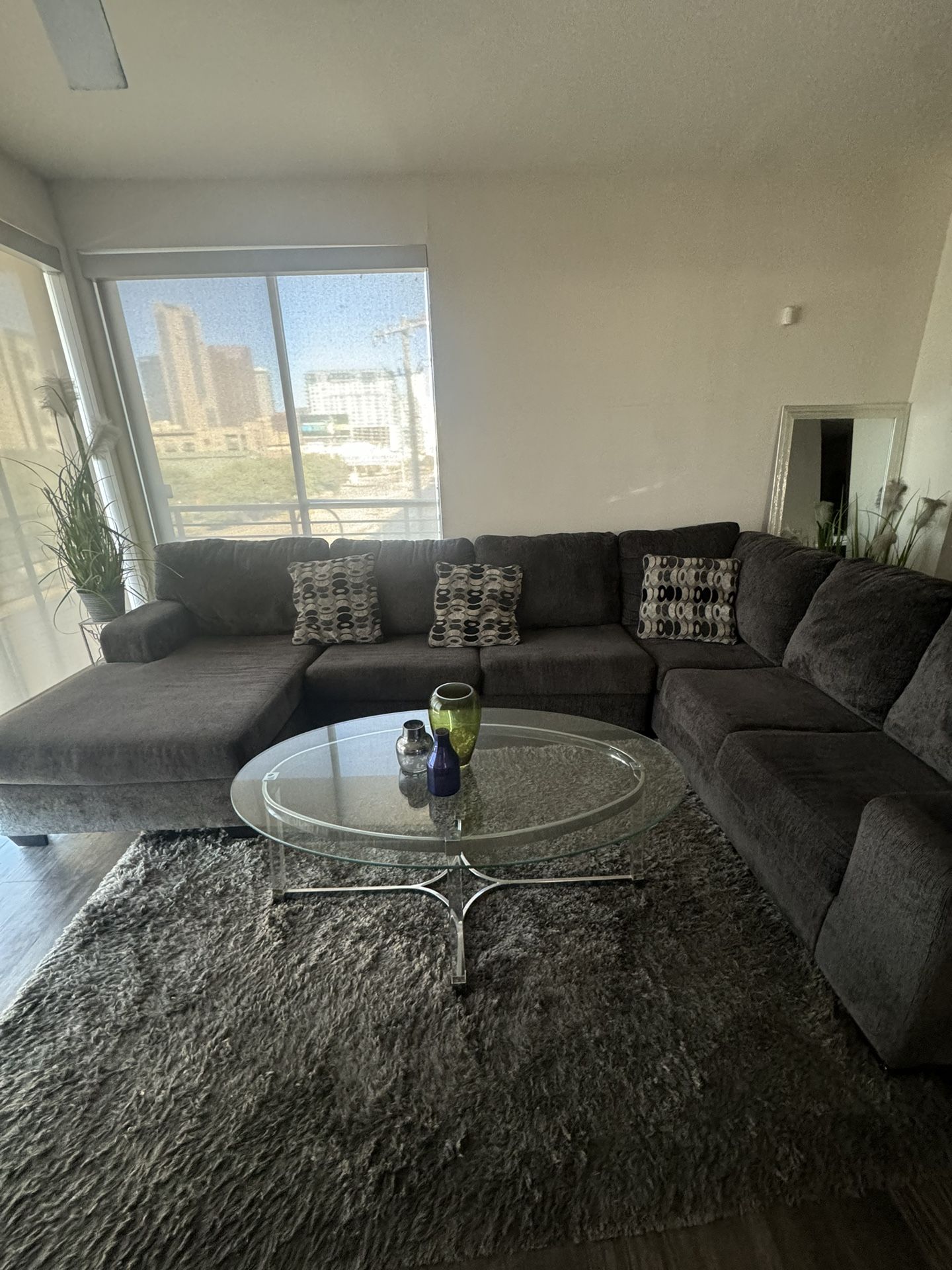 Sectional, Rug, And Coffee Table