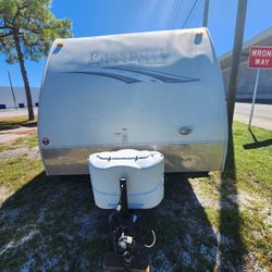 Thirty foot Passport Ultralight, by keystone, pull behind RV