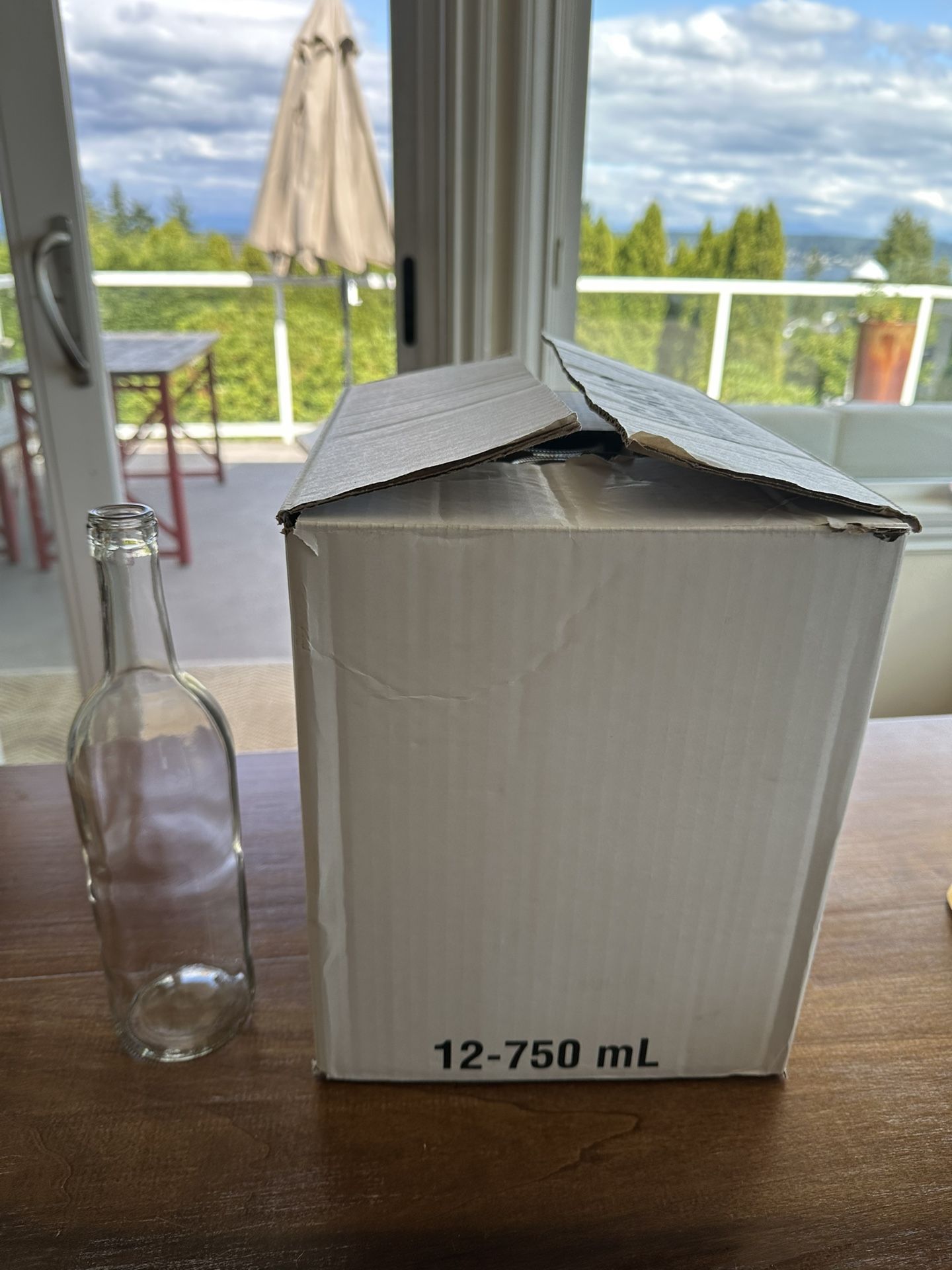 12 - Unused 750ml Clear Wine Bottles