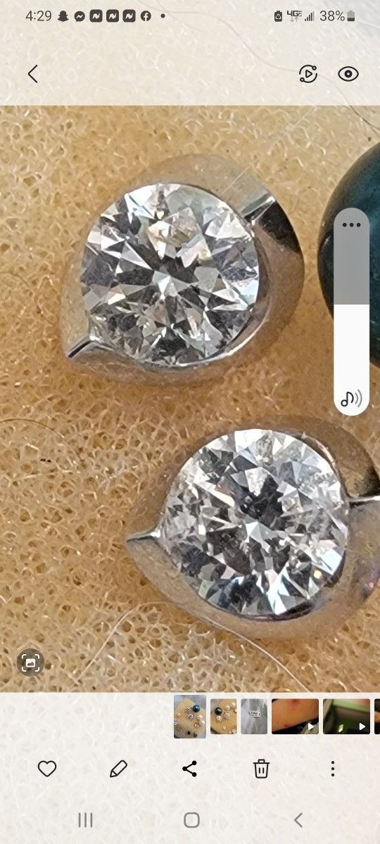 Beautiful Diamond Earrings In 14 K White Gold Infinity Setting