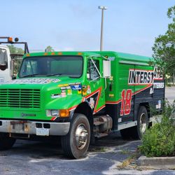 2000 International battery truck with racecar logos still on it runs and drives.