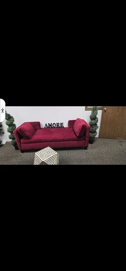 Velvet loveseat/chaise/daybed (looks like a compact 2-seater or lounge piece)