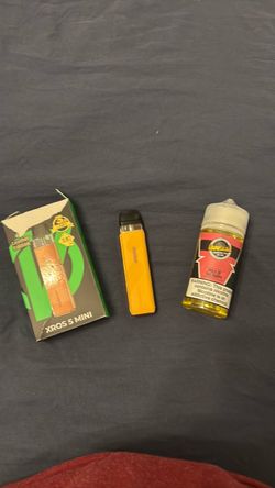 Xros 5 mini and half bottle of juice