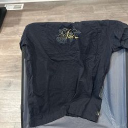 Black and Gold Nike shirt size large