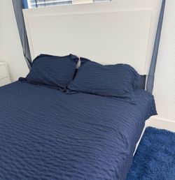 Queen Bed with 3 setting LED lights. White. Wood. Box Spring. Perfect condition. Want to sell fast.