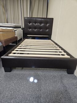 Brand new black faux leather twin platform bedframe