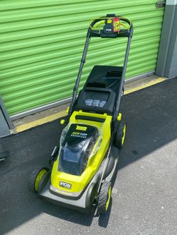 Brand new Ryobi 2 x 18v (same as 40v) self propelled mower w free 18v weedeater