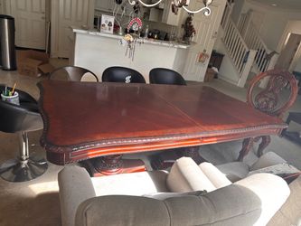 Traditional Dining Table with Carved Details