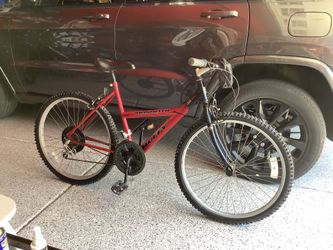 Huffy Monolith 26” mountain bike, 18 speed, excellent tires, breaks work fine, not perfect but not much is anymore. Tool-travel pack in front, heavy d