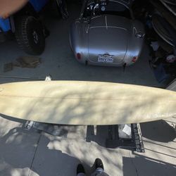 De La Cruz mid length custom surfboard 
