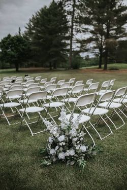 White folding chairs r,e,n,t
