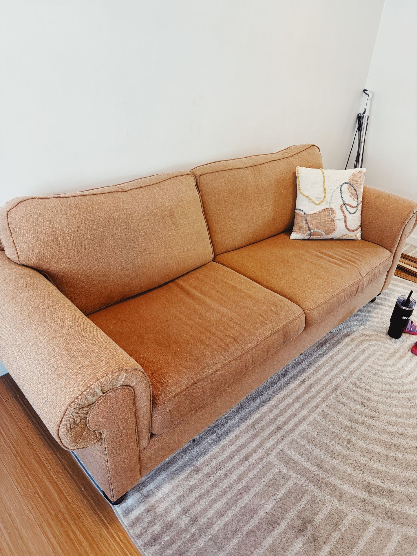 Peach Sofa w 2 World Market Pillows