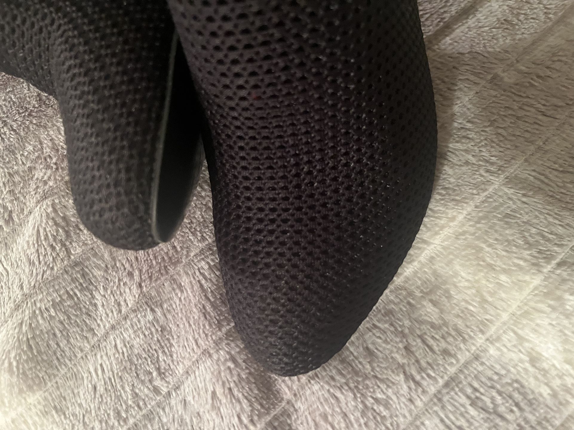 Black short boots for woman size 6.5. Genuine leather insole. Man made material on the outside. Please see last three pictures for wore out details. T