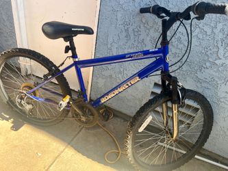 Used mountain bikes: red child mountain bike and blue mountain bike