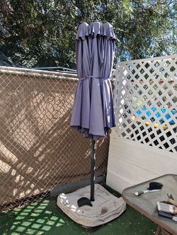 Large patio umbrella. Heavy base