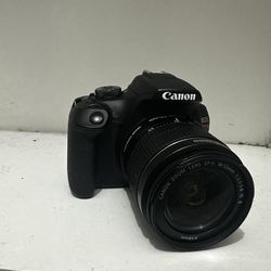 Canon EOS Rebel T7 DSLR Camera with an EF-S 18-55mm lens.